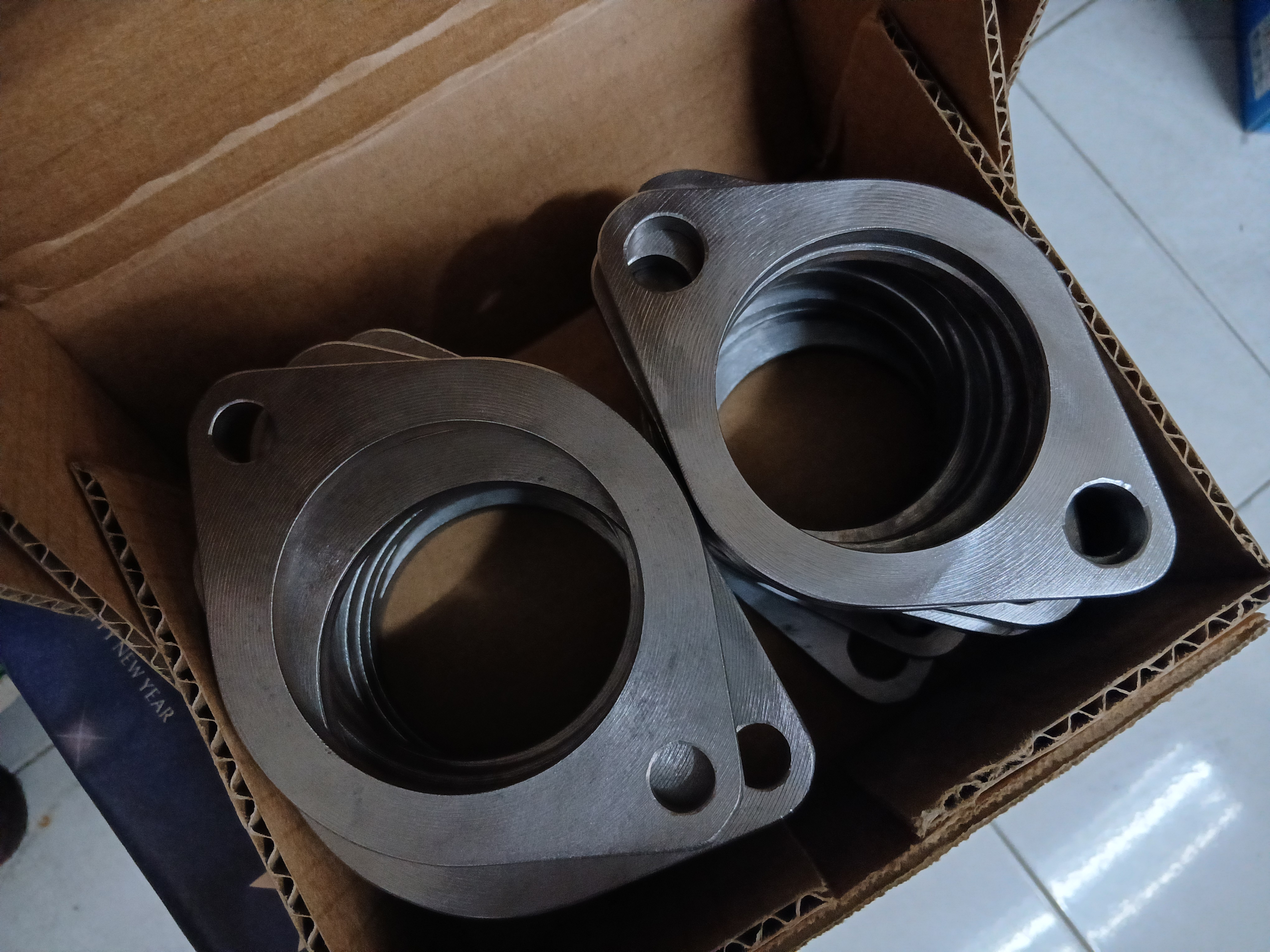2-bolt exhaust flange adapters fabricated as an OEM replacement