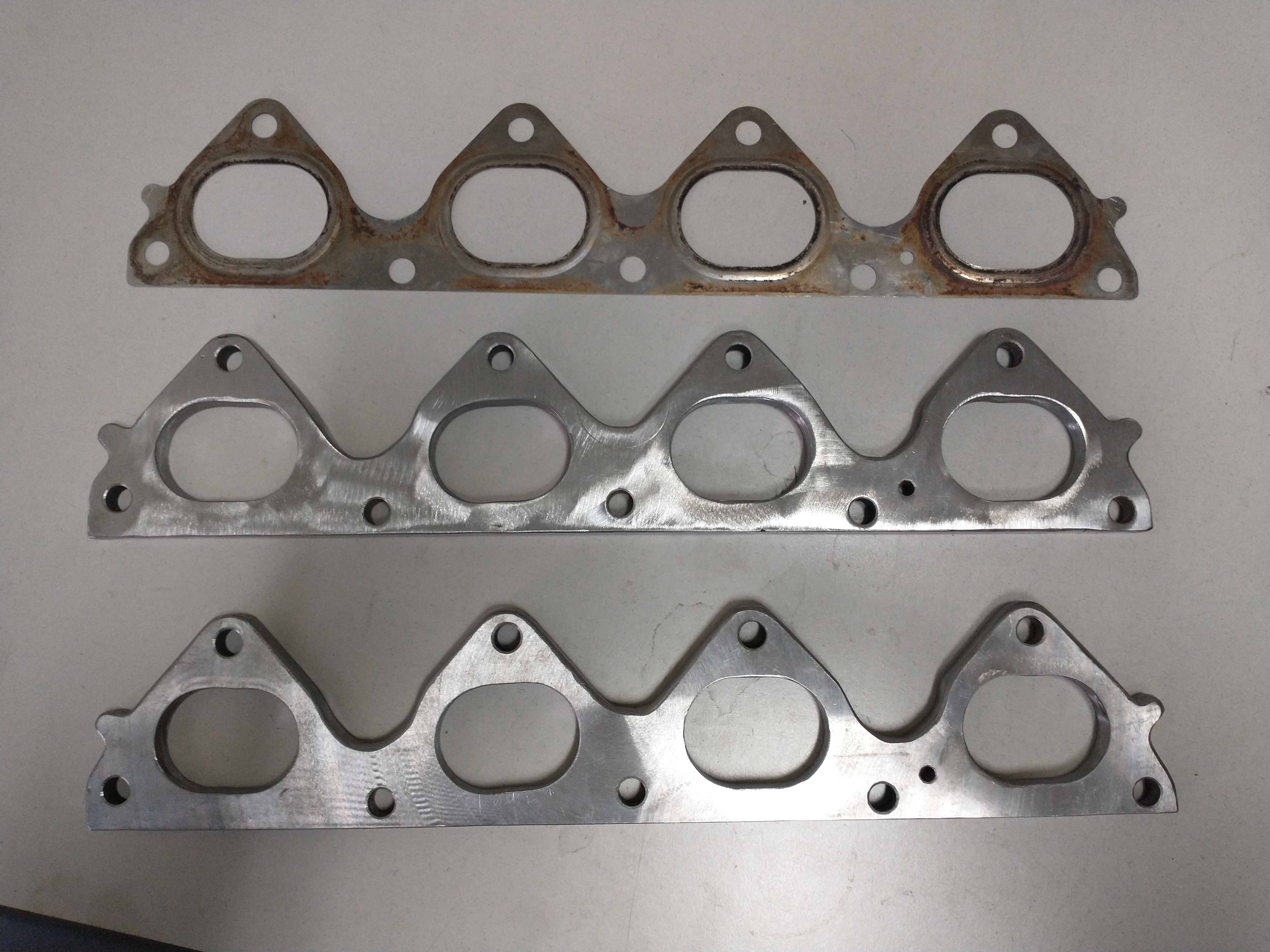 Exhaust manifold gaskets reverse-engineered from a worn set