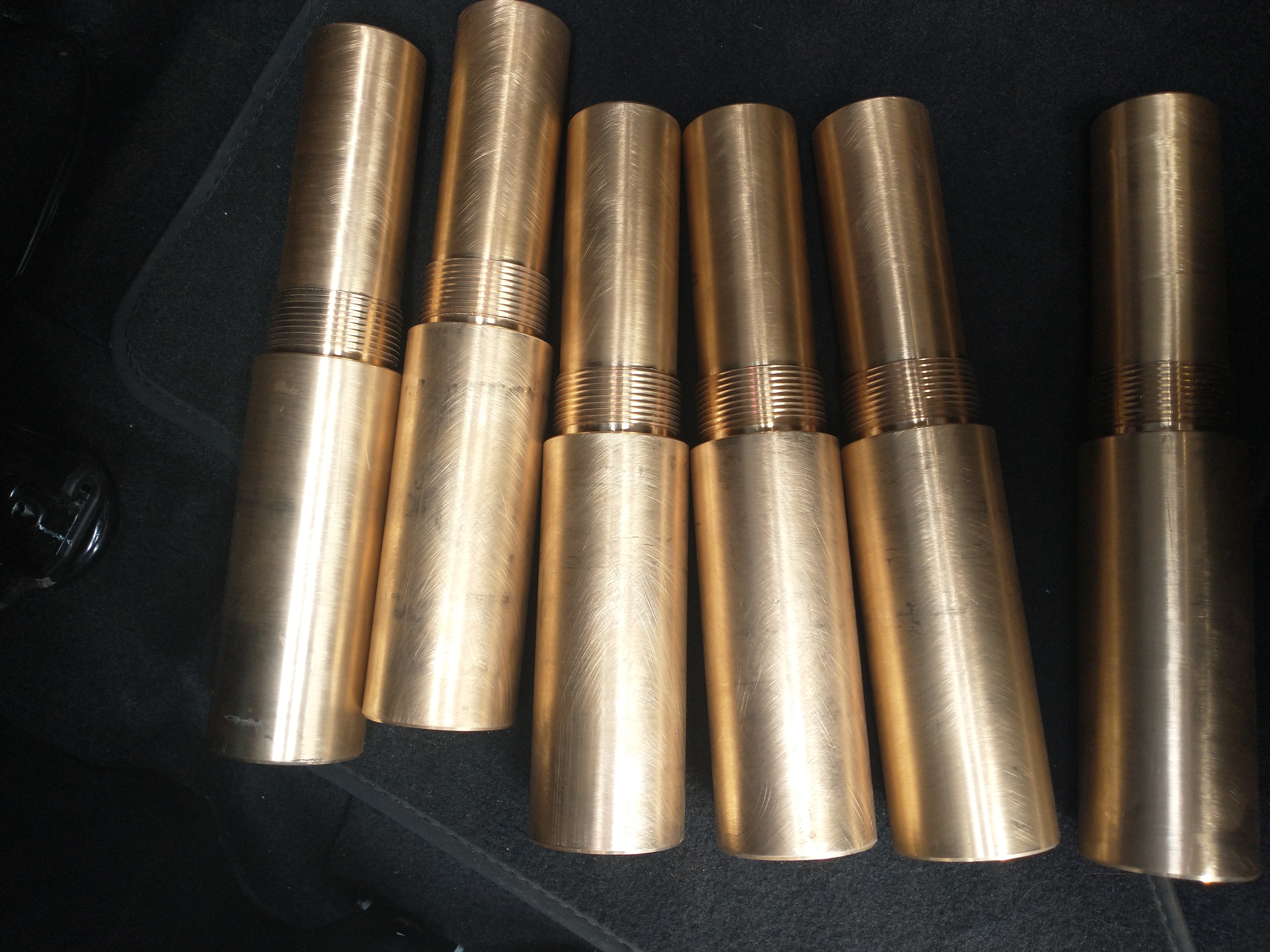 Machined brass replacement sleeves for a worn assembly