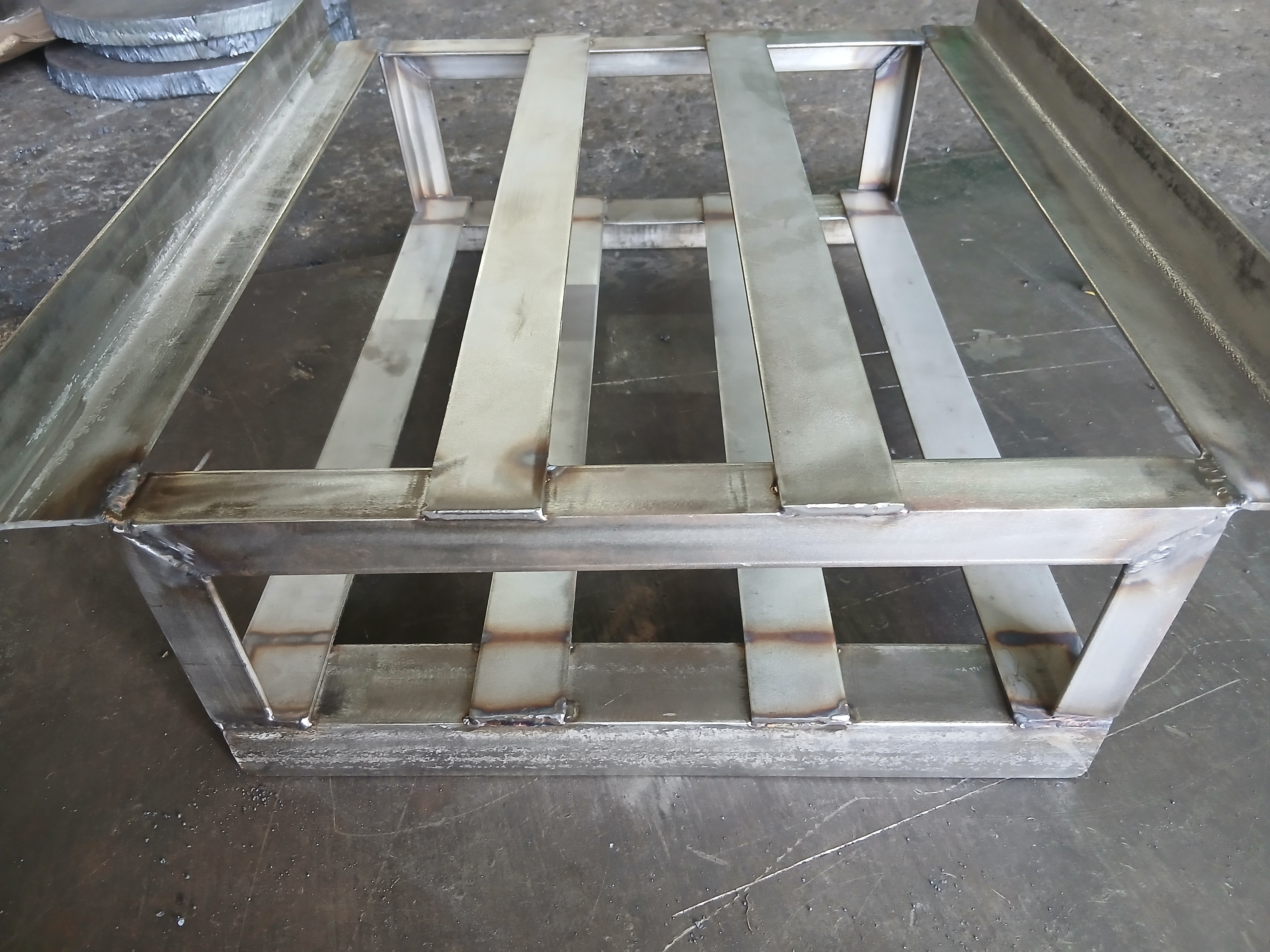 Stainless steel machinery sub-base frame fabricated in the shop